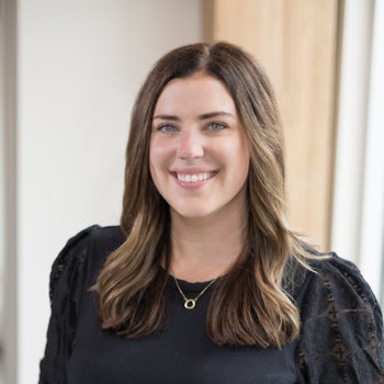 Portrait of Allie Carlson, Broker + Owner